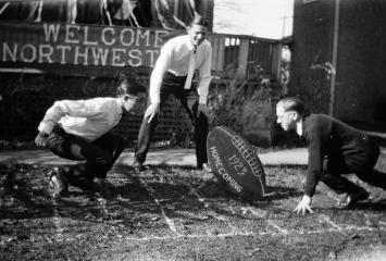 teens playing football 