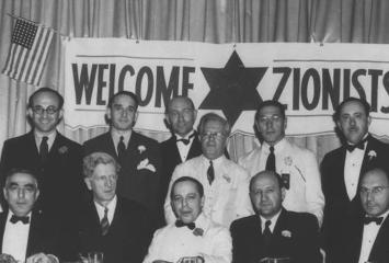 welcome zionists event men in a group